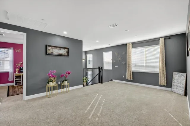 a bathroom with a tub a sink shower and mirror
