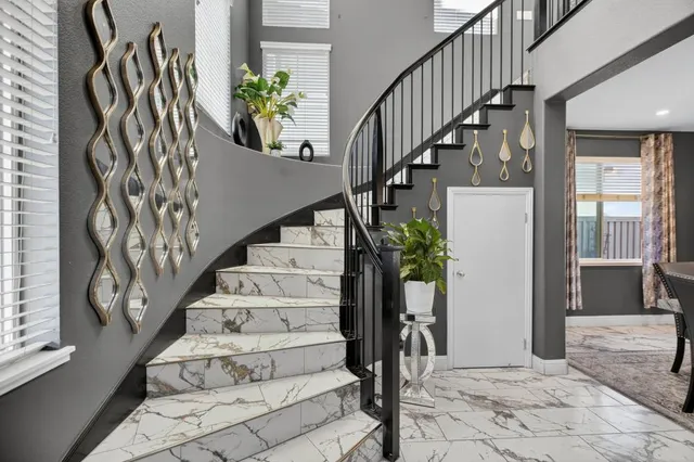 a view of entryway with wooden floor
