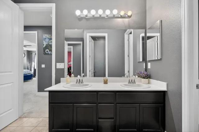 a building outdoor space with patio furniture and potted plants