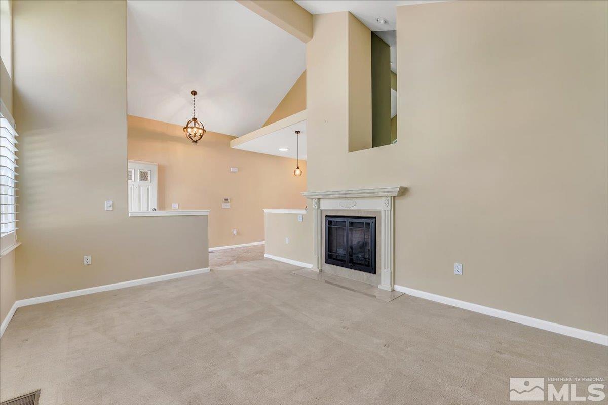 2736 Starr Meadows Loop Reno, NV 89519 - Photo 4 of 40 an empty room with windows