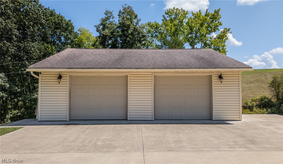 1998 Reese Road Fleming, OH 45729 - Photo 35 of 39 Detached two car garage with lower level workshop area.