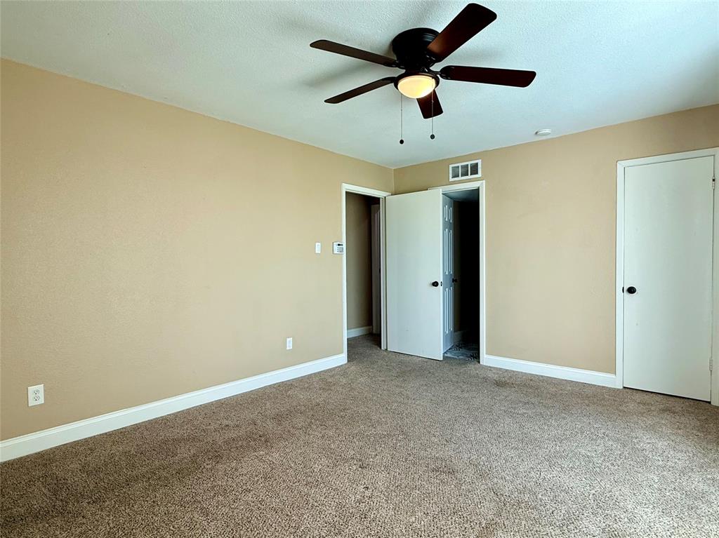 12802 Midway Road, Unit 2015 Dallas, TX 75244 - Photo 12 of 15 a view of an empty room