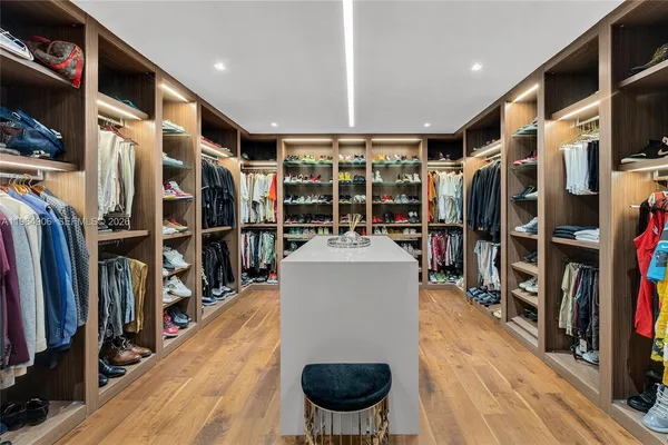 a view of a chairs and table in patio of the house
