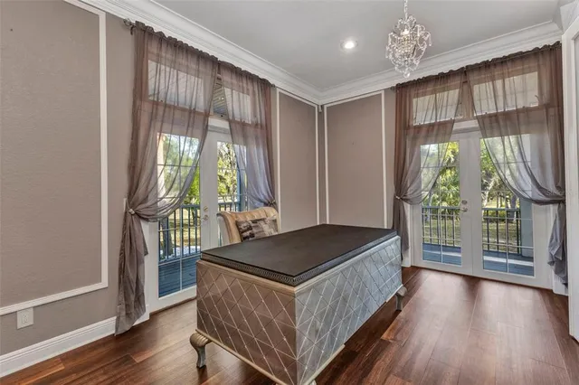 a view of a swimming pool with a lounge chairs