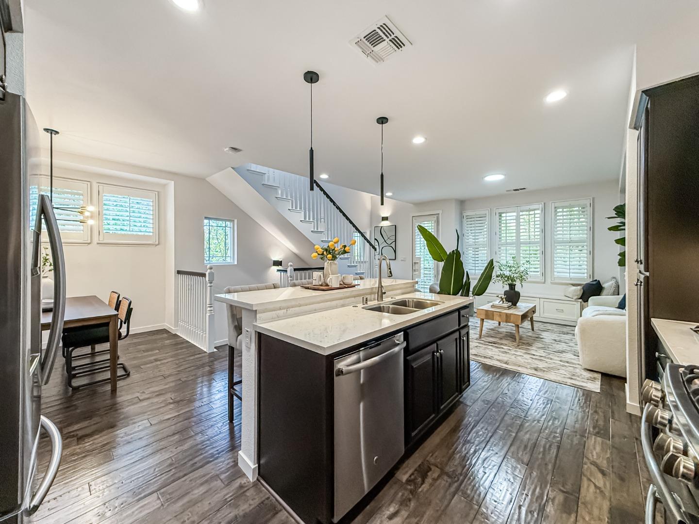311 Geary Way Mountain View, CA 94041 - Photo 12 of 46 a kitchen with a stove and a wooden floor