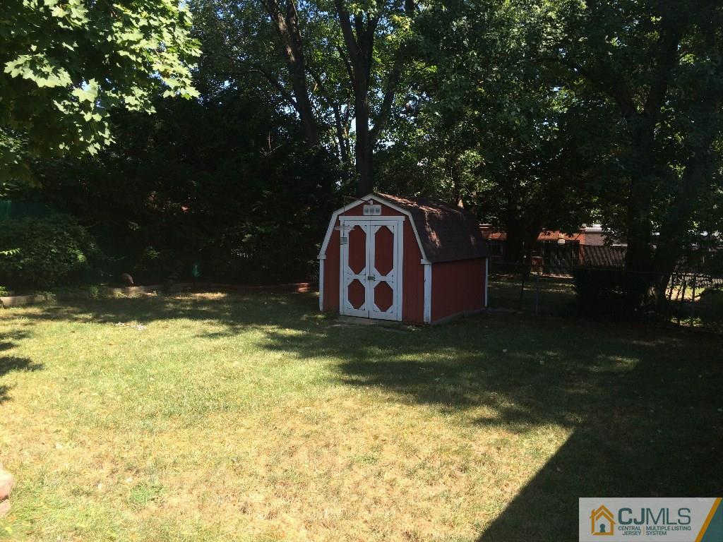 12 Temple Road Old Bridge, NJ 08859 - Photo 14 of 15 a view of backyard with green space
