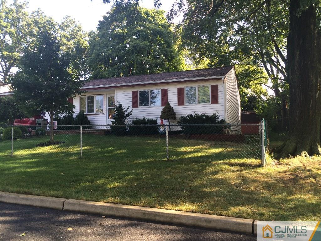 12 Temple Road Old Bridge, NJ 08859 - Photo 3 of 15 a view of a house with a yard deck and a large tree