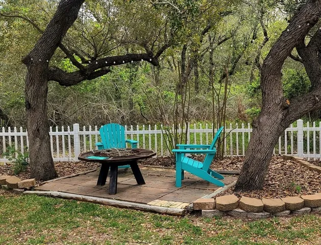 a view of a lounge chair in the garden