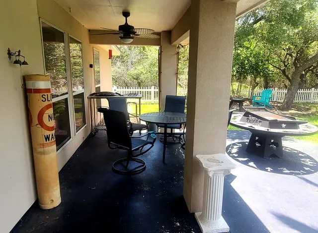 a view of a living room and dining room
