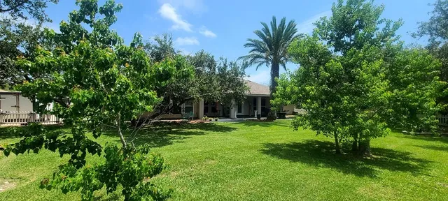 a view of a backyard with a garden