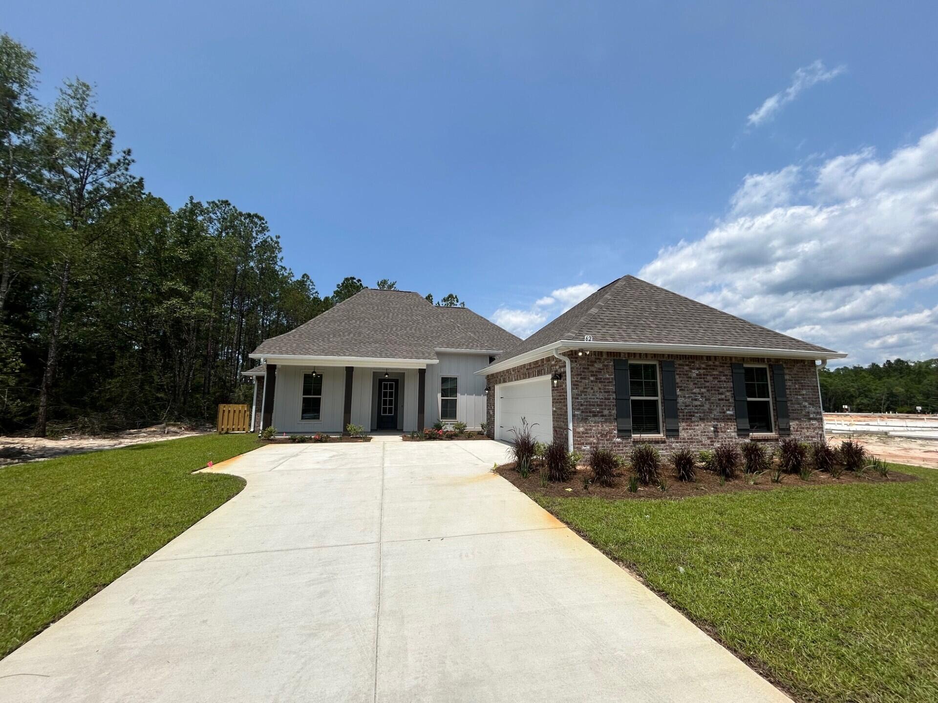 a front view of a house with patio