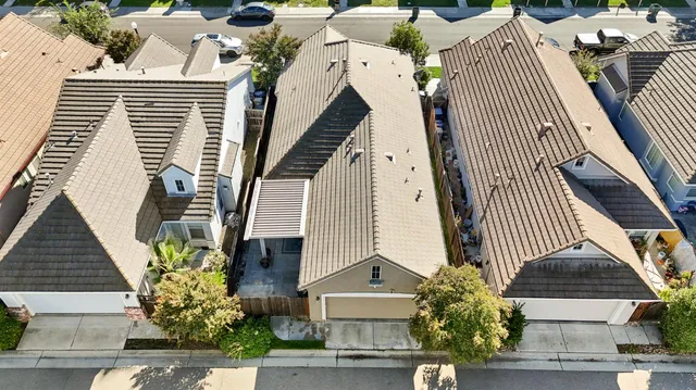 an aerial view of a house with balcony