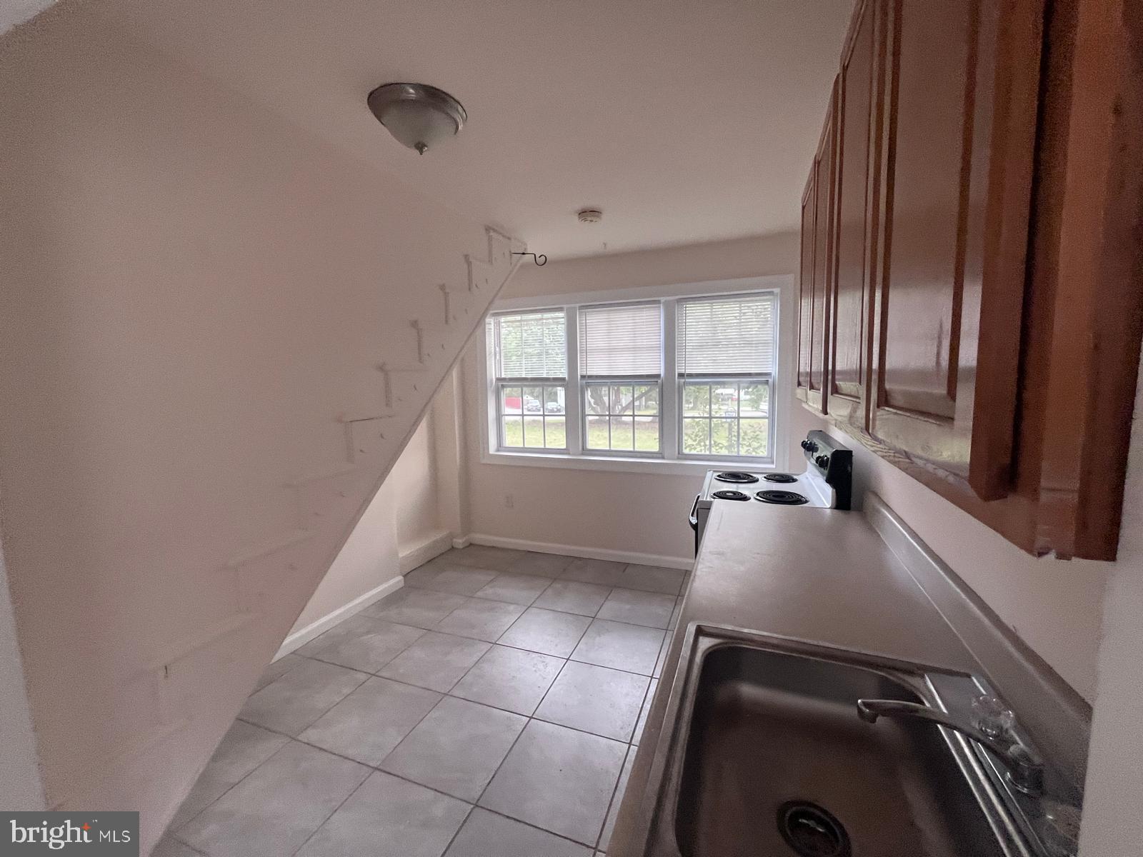 8617 Woodyard Road Clinton, MD 20735 - Photo 21 of 51 a view of a kitchen with a sink and a window