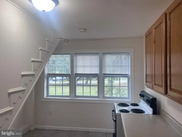 a room with windows and storage