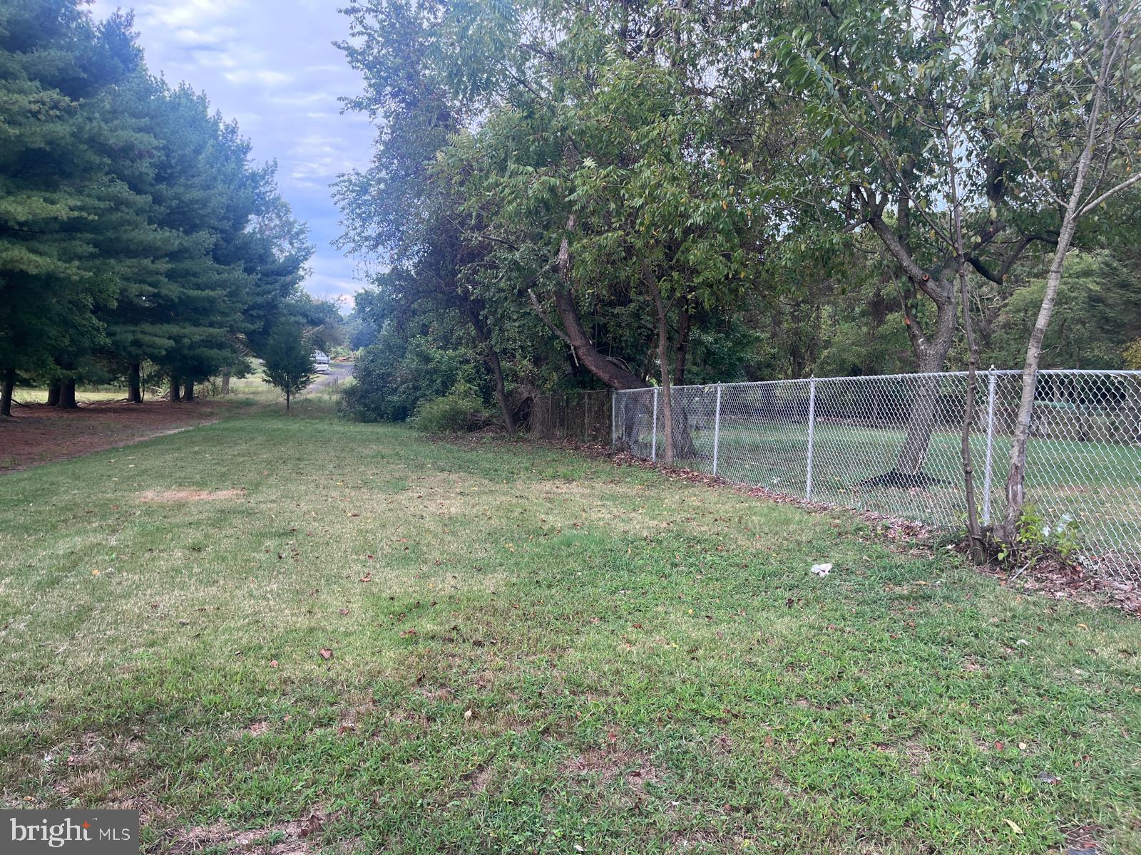 8617 Woodyard Road Clinton, MD 20735 - Photo 3 of 51 a backyard of a house with lots of green space