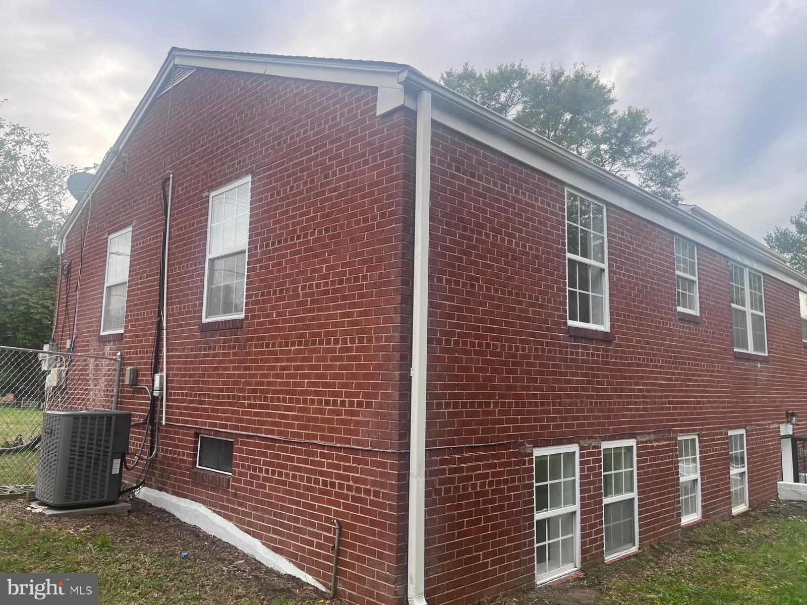 8617 Woodyard Road Clinton, MD 20735 - Photo 48 of 51 a brick building with a large windows