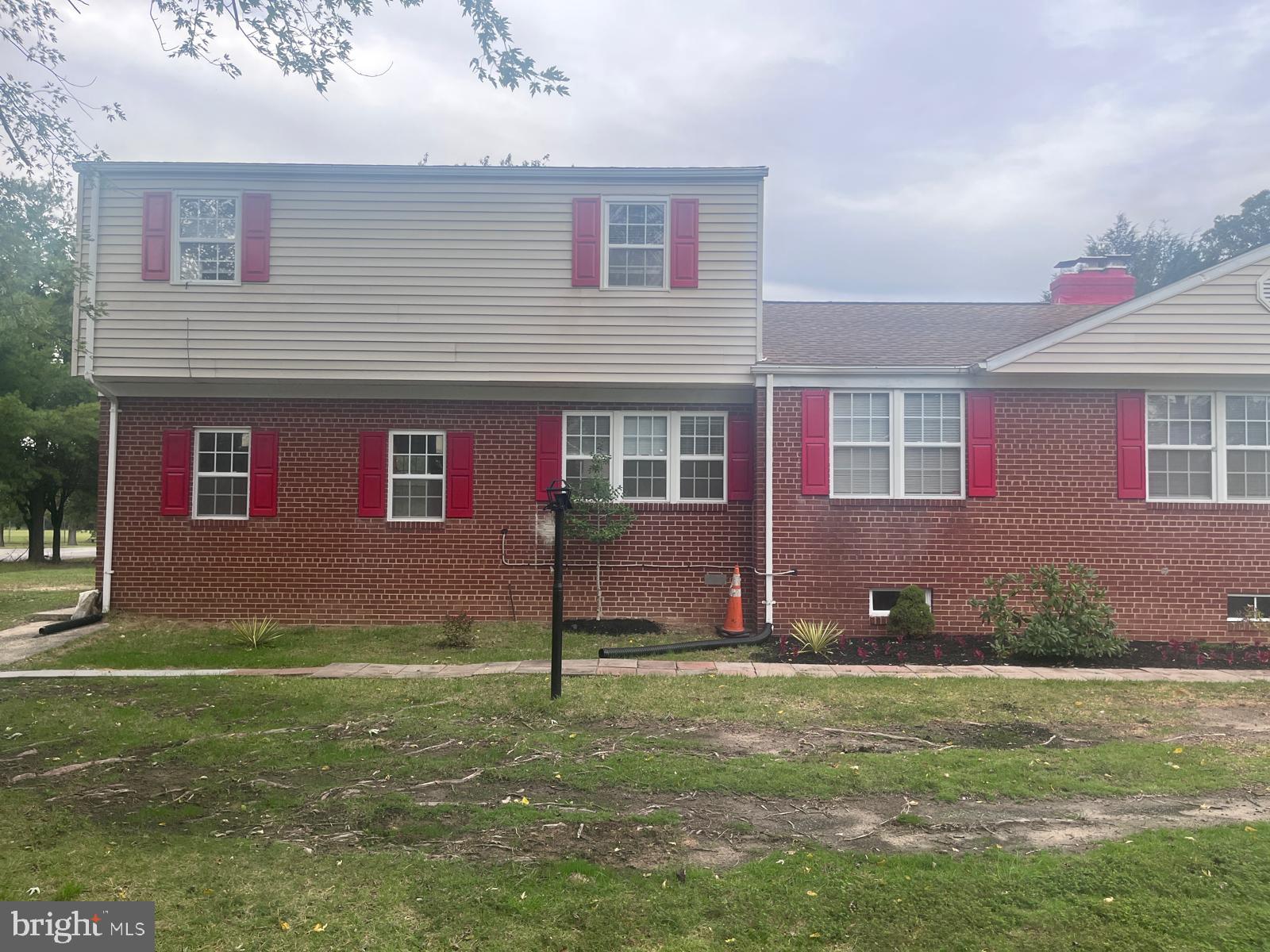 8617 Woodyard Road Clinton, MD 20735 - Photo 50 of 51 a front view of a house with a garden