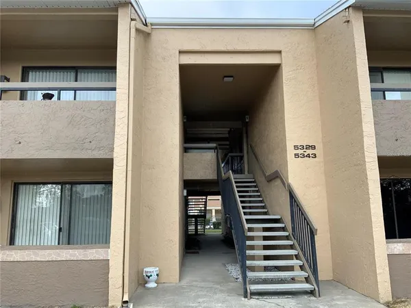 a view of an entryway with staircase