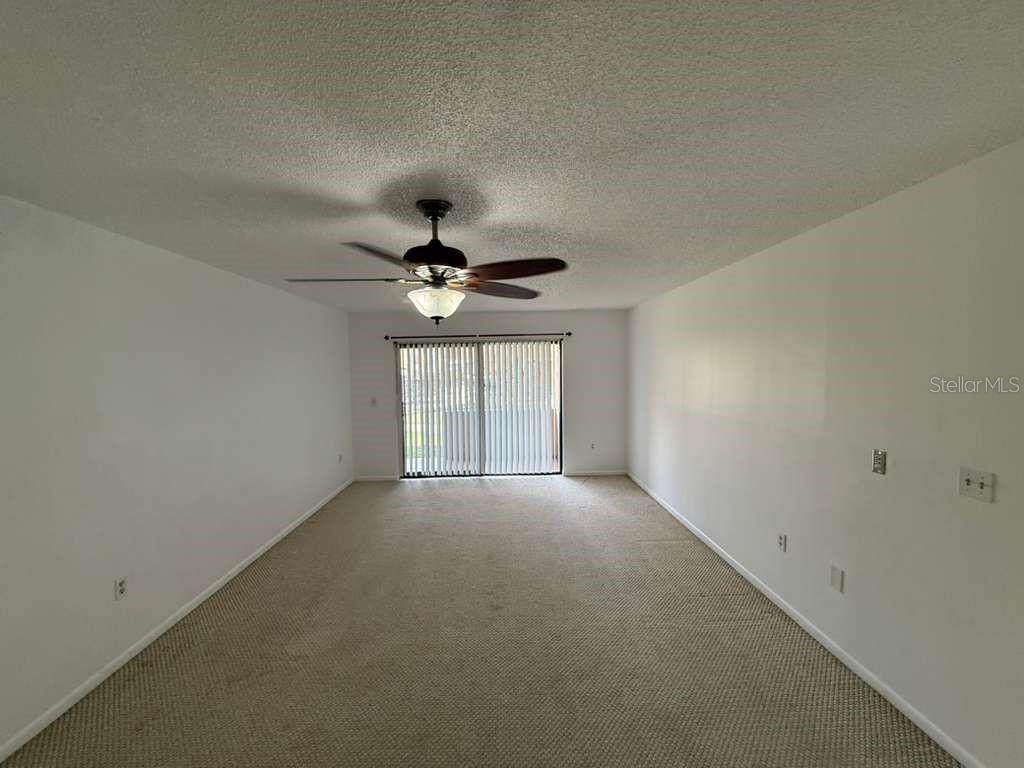 5333 Vineland Road, Unit 101 Orlando, FL 32811 - Photo 3 of 19 a view of an empty room with a window