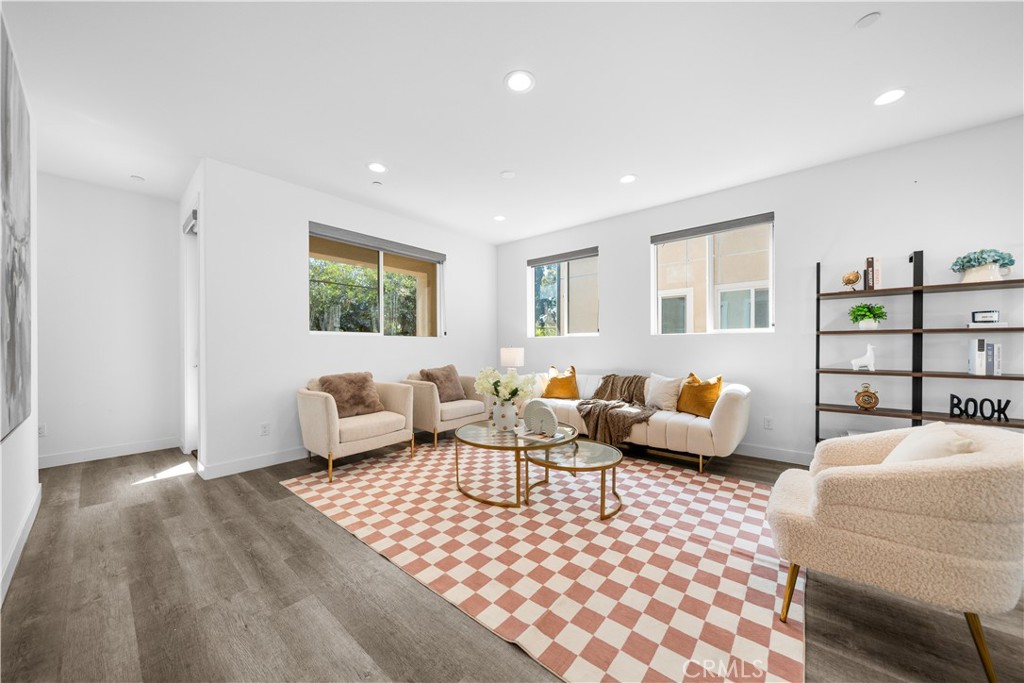 23238 Marigold Avenue Torrance, CA 90502 - Photo 16 of 38 a living room with furniture and a window