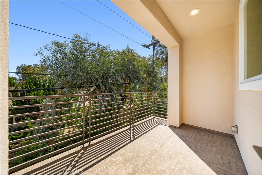 23238 Marigold Avenue Torrance, CA 90502 - Photo 19 of 38 a view of a pathway with a building in the background
