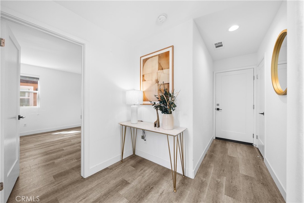 23238 Marigold Avenue Torrance, CA 90502 - Photo 5 of 38 a view of entryway with wooden floor