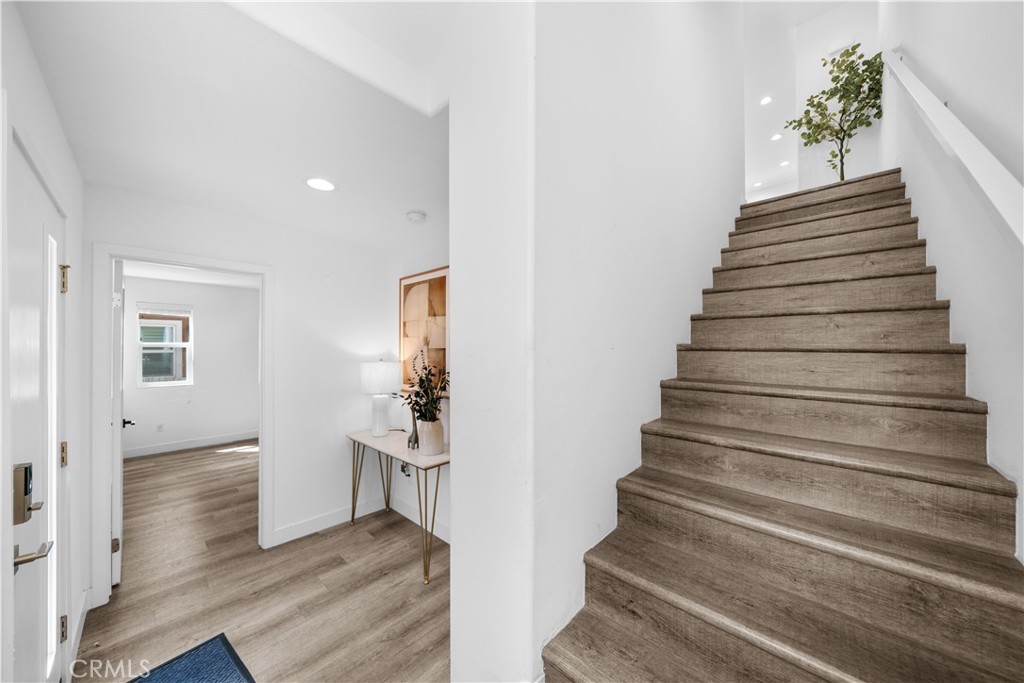 23238 Marigold Avenue Torrance, CA 90502 - Photo 8 of 38 a view of entryway and hall with wooden floor