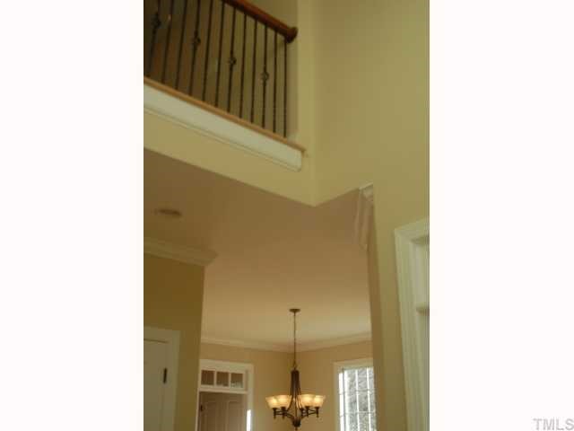 3614 Pickett Road Durham, NC 27705 - Photo 9 of 12 Foyer opens to formal living and dining room with bridge above toe 3rd and 4th bedrooms