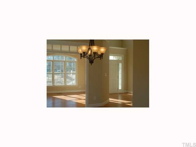 3614 Pickett Road Durham, NC 27705 - Photo 3 of 12 Spacious formal living room with picture taken from dining room.
