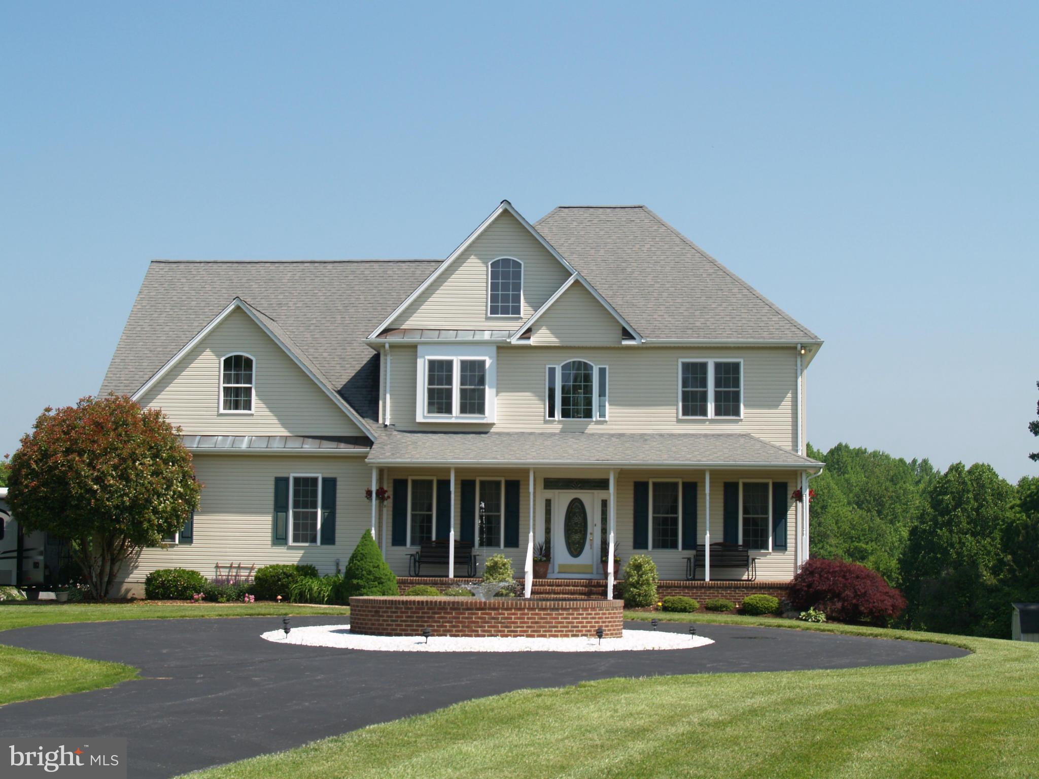 92 Friendship Road Friendship, MD 20758 - Photo 1 of 27 a front view of a house with a yard