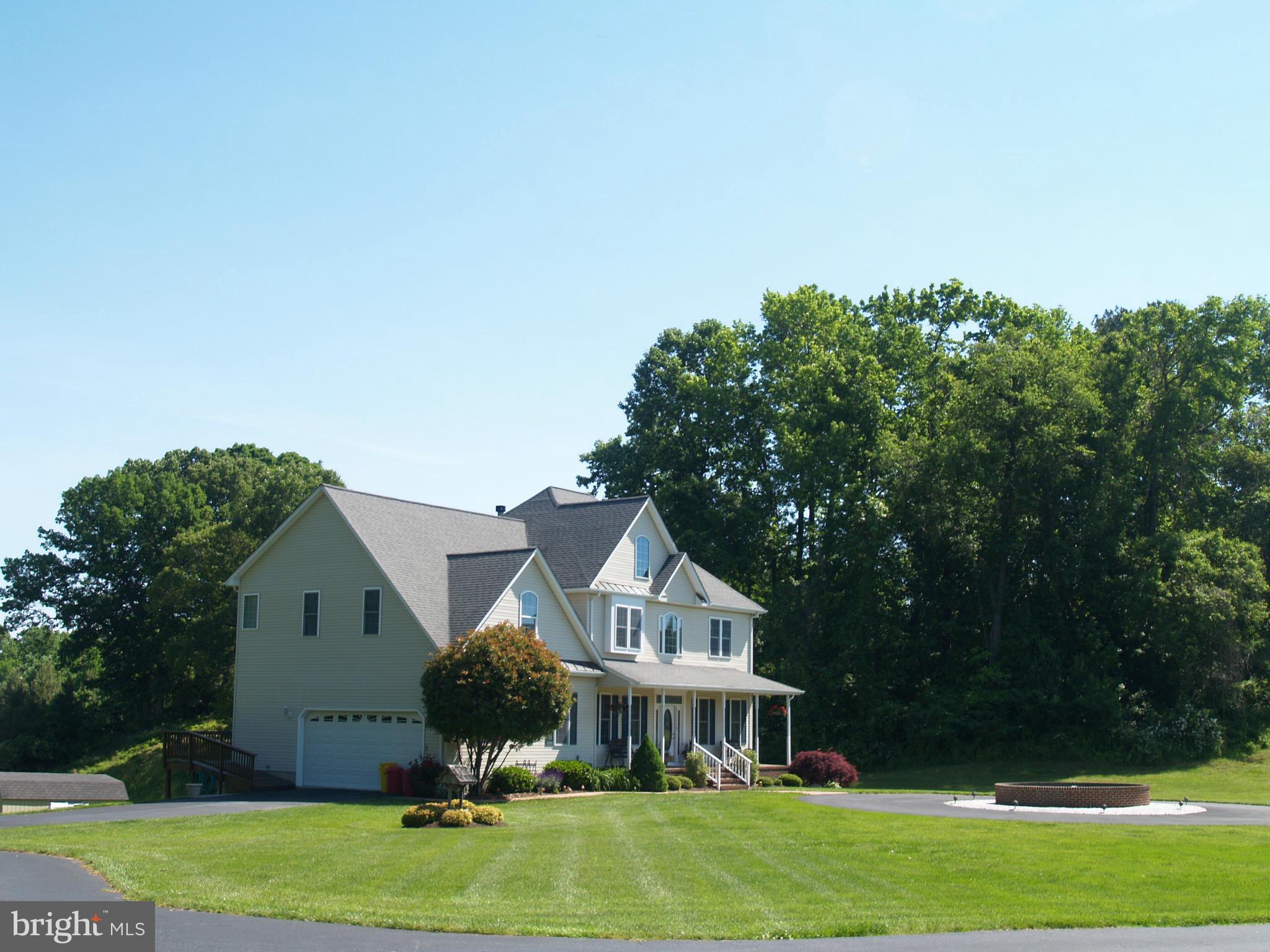 92 Friendship Road Friendship, MD 20758 - Photo 26 of 27 a front view of a house with a garden