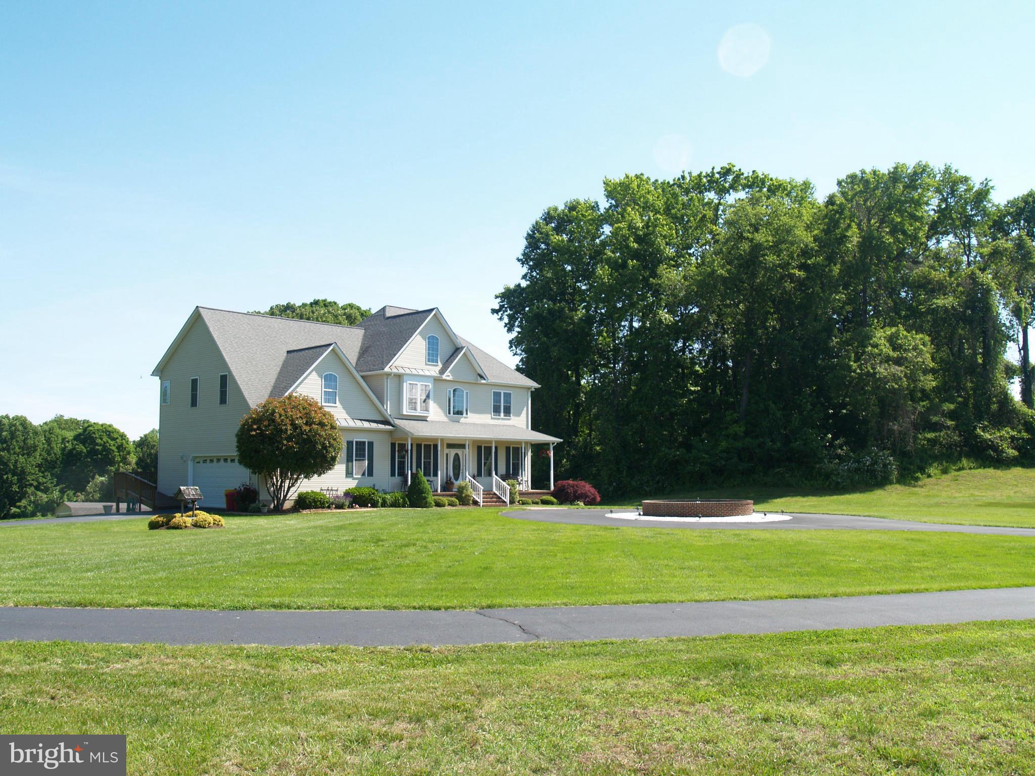 92 Friendship Road Friendship, MD 20758 - Photo 27 of 27 a view of a big house with a big yard and large trees