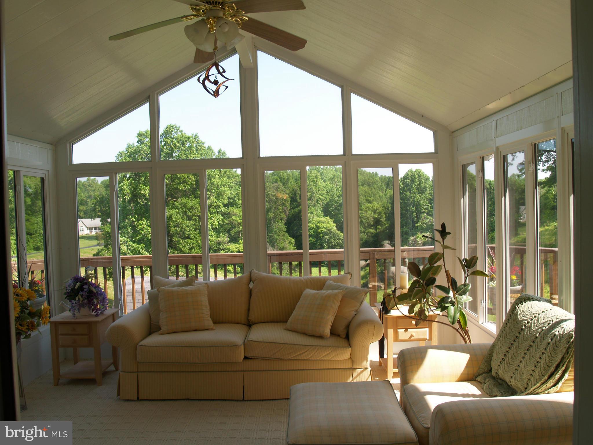 92 Friendship Road Friendship, MD 20758 - Photo 4 of 27 a living room with furniture and a large window