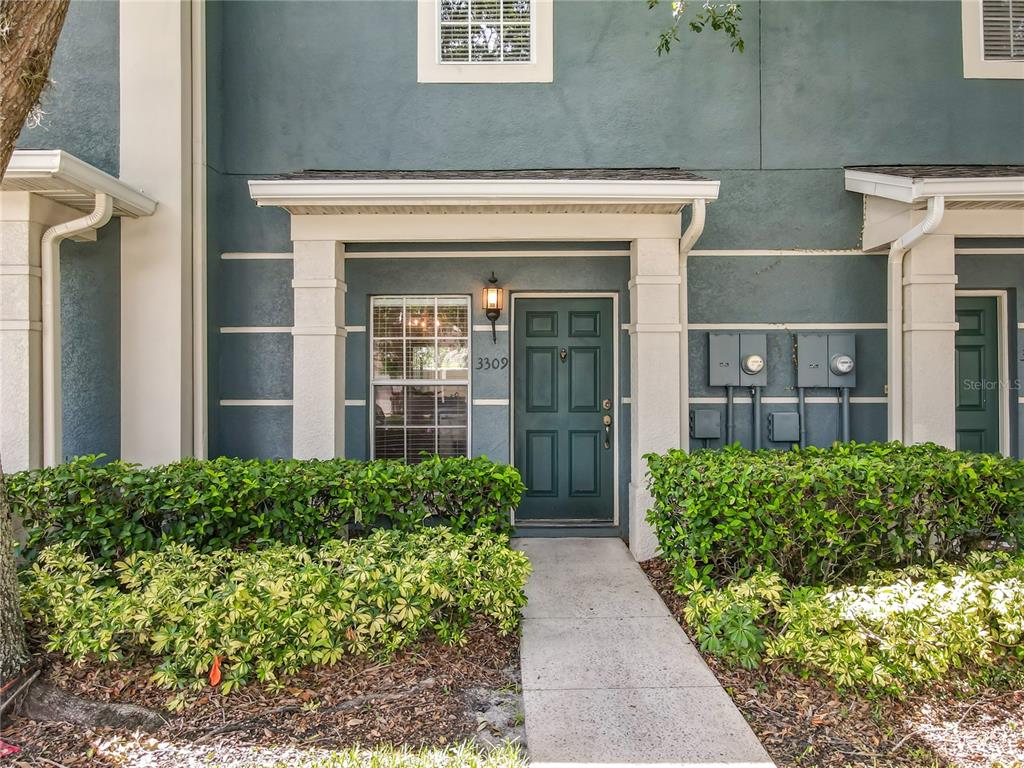 3309 Wilshire Way Road, Unit 3 Orlando, FL 32829 - Photo 2 of 43 a view of entrance of building