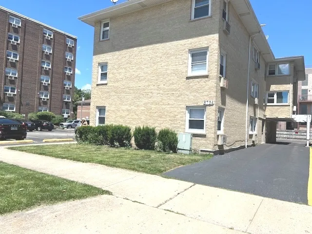 a view of a building with a street
