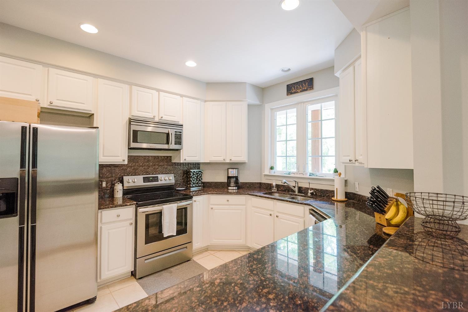 96 Quarry Road Farmville, VA 23901 - Photo 12 of 72 a kitchen with a sink stove top oven and refrigerator