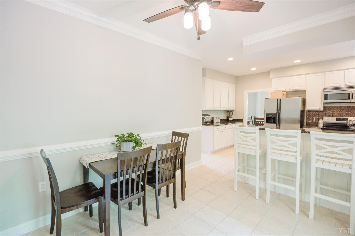 96 Quarry Road Farmville, VA 23901 - Photo 13 of 72 a view of a dining room with furniture and wooden floor