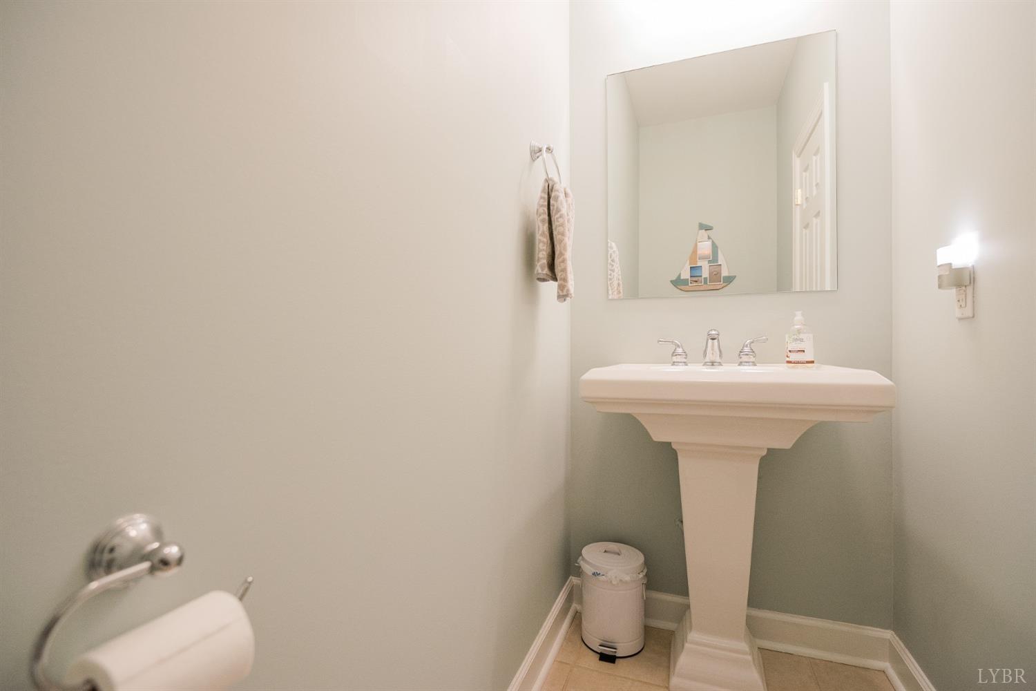 96 Quarry Road Farmville, VA 23901 - Photo 16 of 72 a bathroom with a sink toilet and mirror