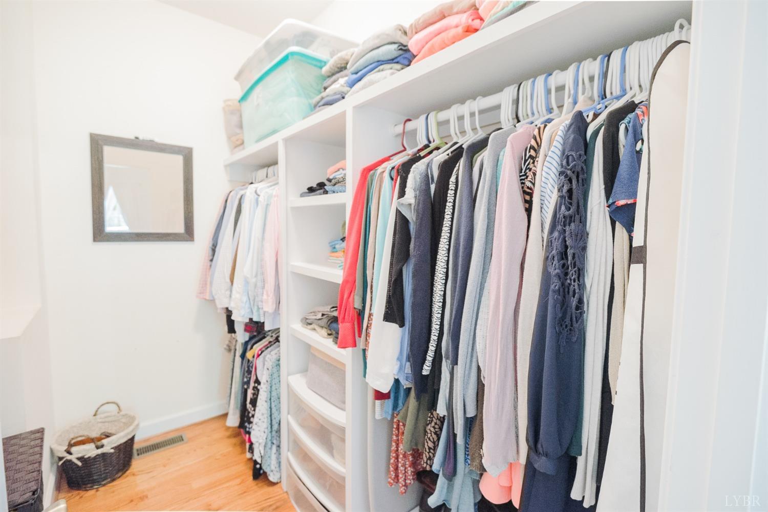 96 Quarry Road Farmville, VA 23901 - Photo 25 of 72 a view of walk in closet with clothes and shoes