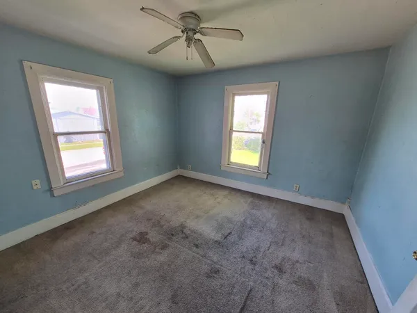 a view of empty room with front door