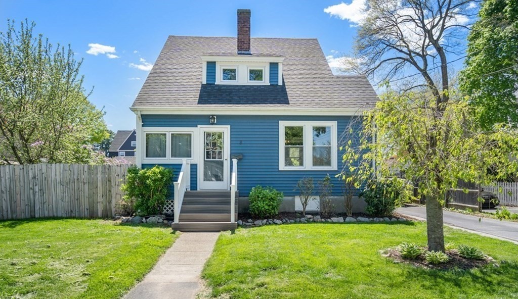8 Lindbergh Road Framingham, MA 01702 - Photo 1 of 25 a front view of a house with a yard