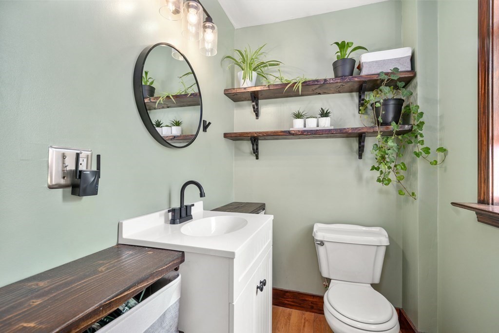 8 Lindbergh Road Framingham, MA 01702 - Photo 12 of 25 a bathroom with a toilet and a sink