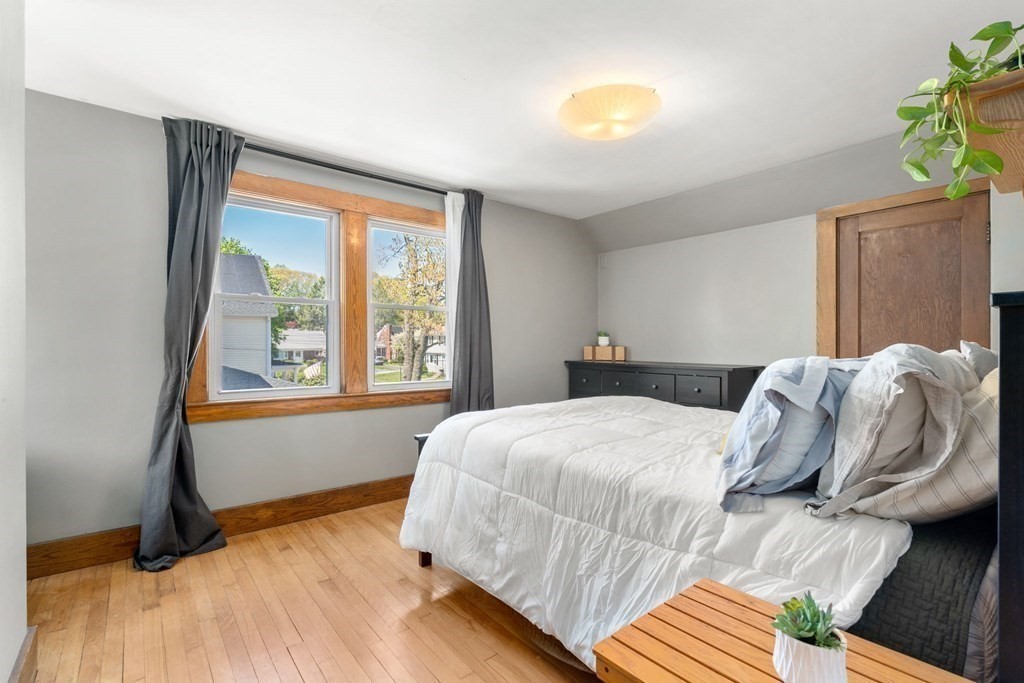 8 Lindbergh Road Framingham, MA 01702 - Photo 15 of 25 a bedroom with a bed and a window