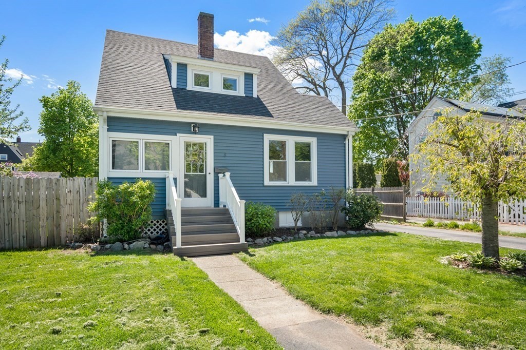 8 Lindbergh Road Framingham, MA 01702 - Photo 2 of 25 a front view of a house with a yard