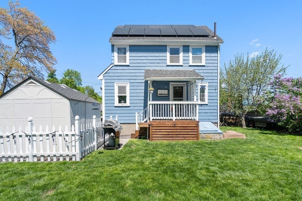 8 Lindbergh Road Framingham, MA 01702 - Photo 21 of 25 a front view of a house with garden