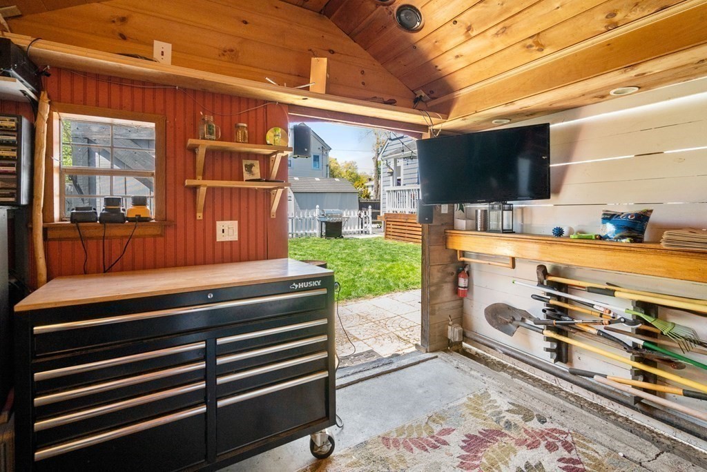 8 Lindbergh Road Framingham, MA 01702 - Photo 25 of 25 a outdoor living space with patio furniture and a flat screen tv