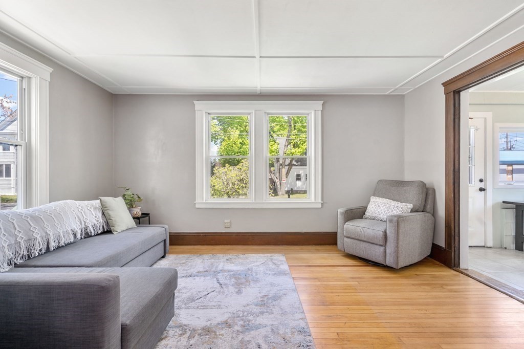 8 Lindbergh Road Framingham, MA 01702 - Photo 5 of 25 a living room with furniture and a window