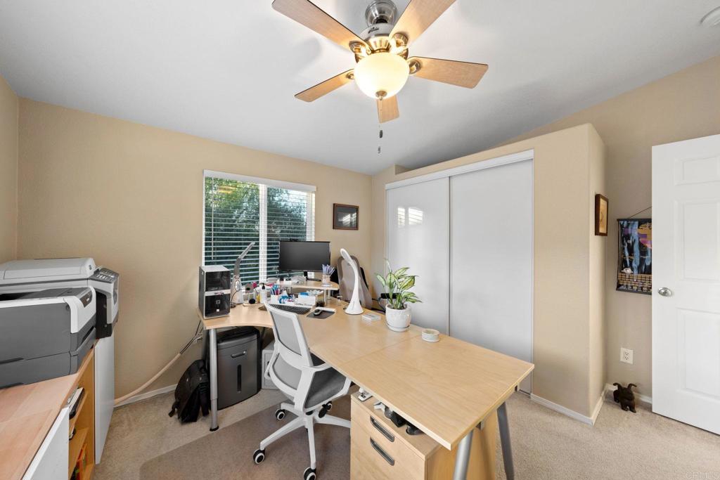 9100 Single Oak Drive, Unit 26 Lakeside, CA 92040 - Photo 12 of 46 a view of a workspace with furniture and a window