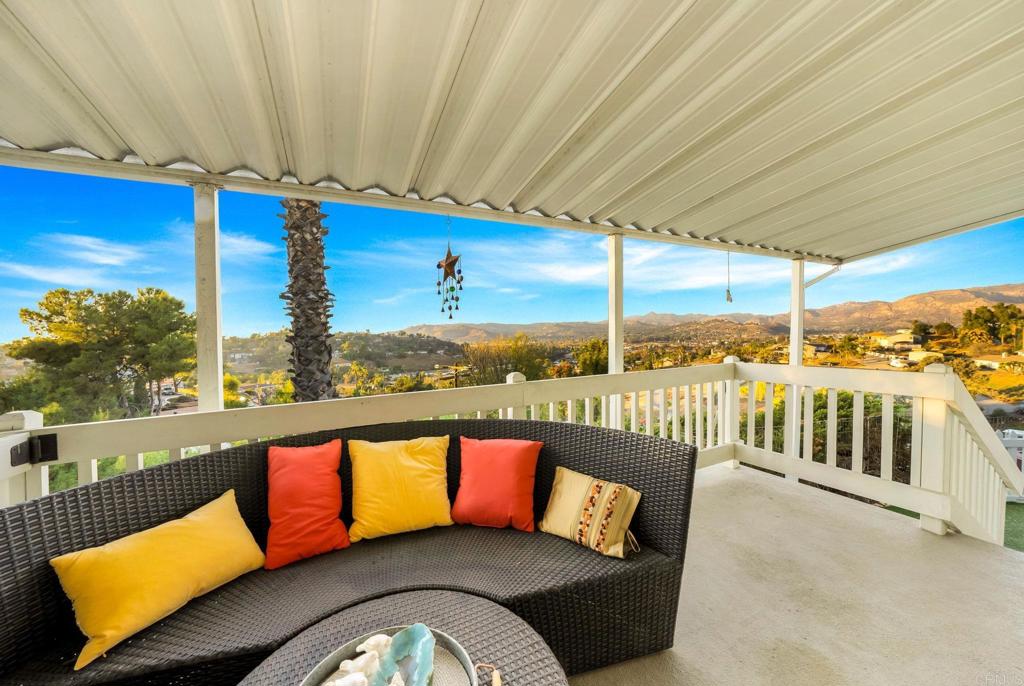 9100 Single Oak Drive, Unit 26 Lakeside, CA 92040 - Photo 29 of 46 a balcony with furniture and city view