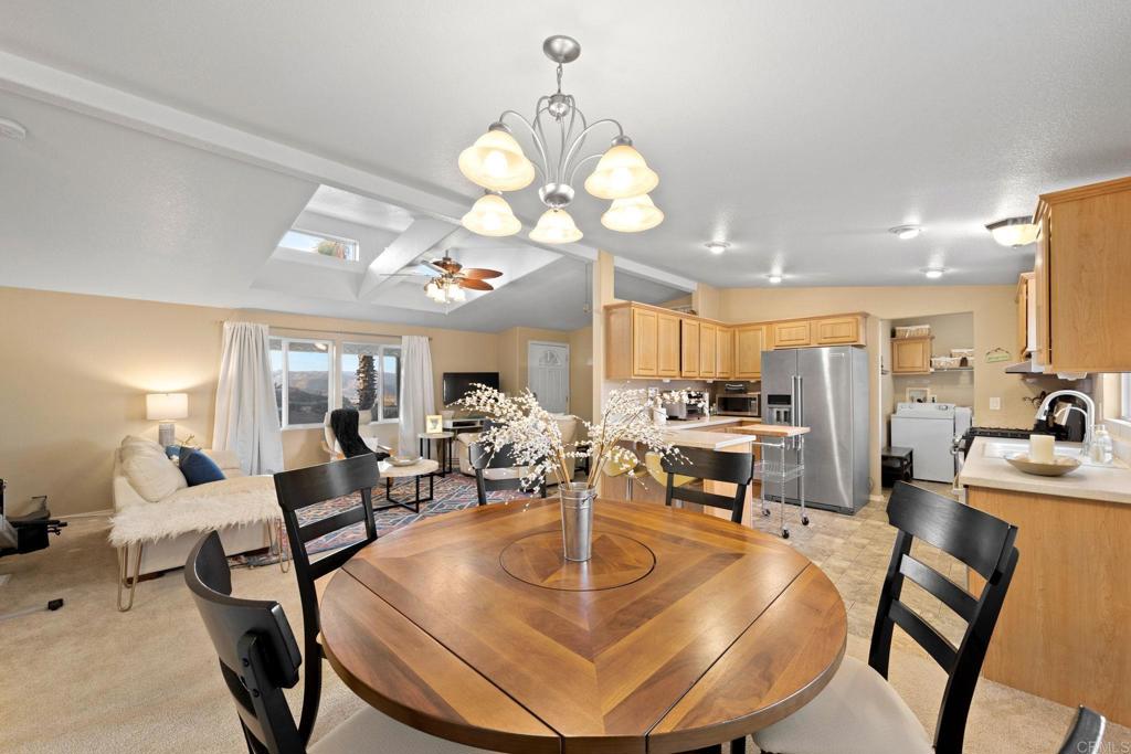 9100 Single Oak Drive, Unit 26 Lakeside, CA 92040 - Photo 3 of 46 a view of a dining room with furniture
